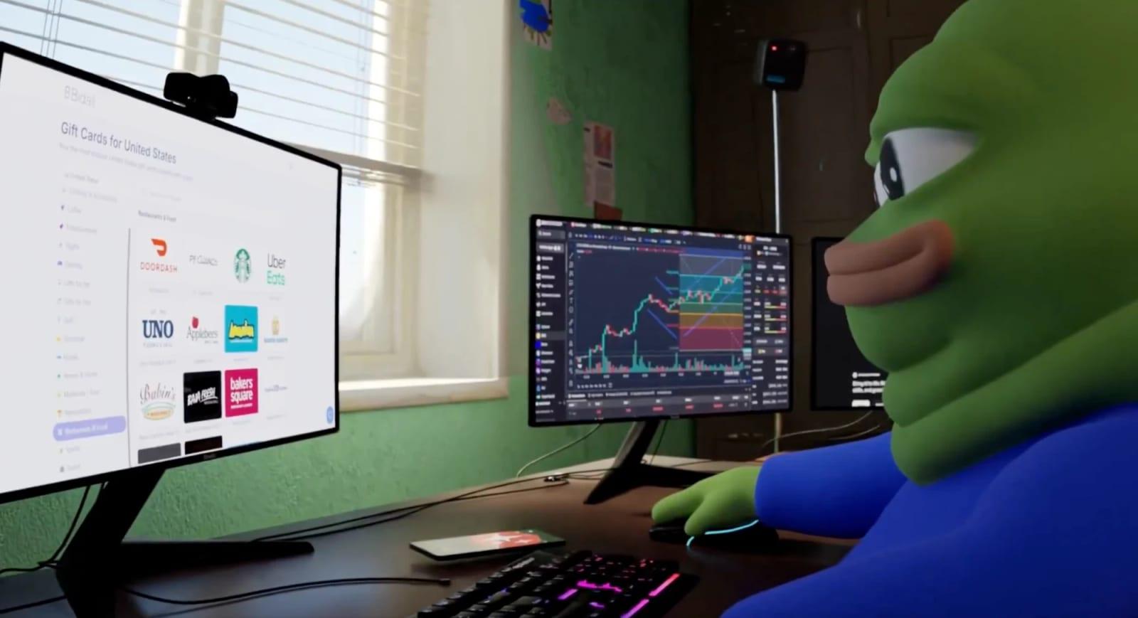 Beppe, a green 3D-rendered frog in a blue hoodie, at a desk with the Bidali gift card store on one monitor and trading charts on another